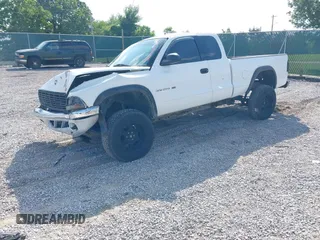 2000 Dodge Dakota z VIN 1B7GL22X1YS740359, wystawiony jako IAAI lot #42430964 z przebiegiem 213 435 mil mil oraz . Historia ofert i sprzedaży dostępna na DreamBid. Obrazek 2.