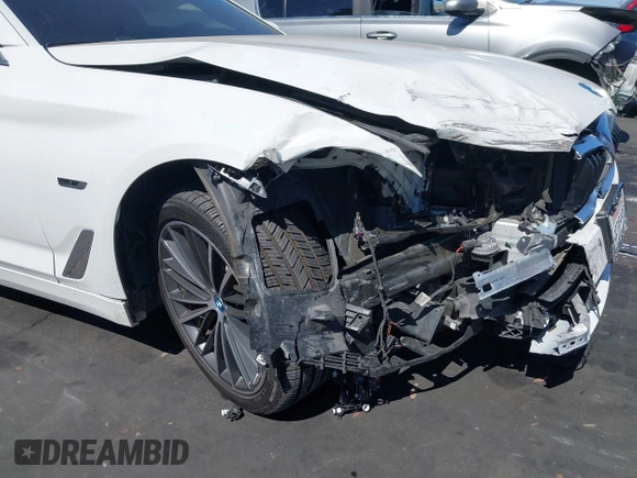 2023 BMW 5 Series 530e with VIN WBA13AG02PCN16602, listed as a IAAI auction lot 42394701 with Not provided miles and . Bid and sale history available at DreamBid. Image 12.