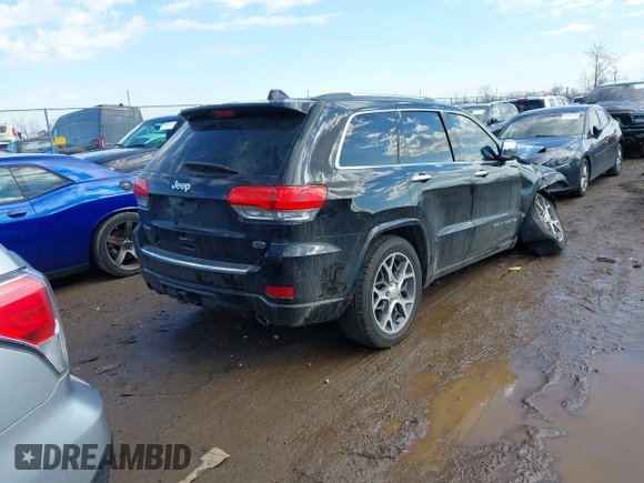 2019 Jeep Grand Cherokee Overland with VIN 1C4RJFCGXKC688543, listed as a IAAI auction lot 41643678 with 65,182 mi miles. Bid and sale history available at carsss.com. Image 4.