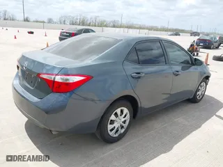 2016 Toyota Corolla L with VIN 5YFBURHE9GP376830, listed as a IAAI auction lot 41809480 with 106,922 mi miles. Bid and sale history available at carsss.com. Image 4.