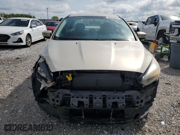 2017 Ford Focus SE with VIN 1FADP3F27HL301890, listed as a Copart auction lot 55252675 with 76,568 mi miles and Salvage title. Bid and sale history available at DreamBid. Image 5.