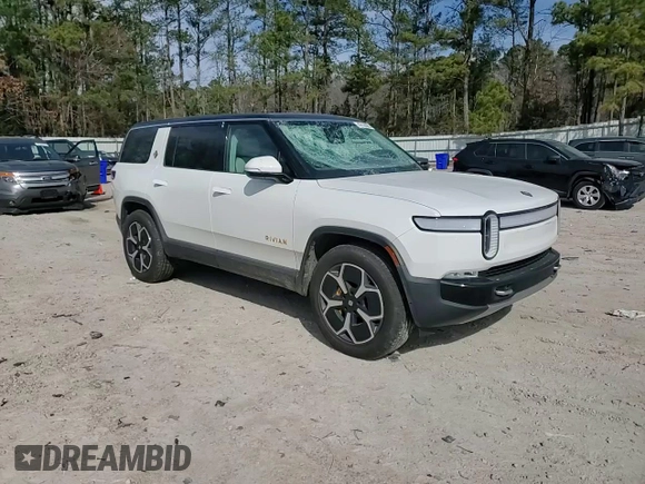 2024 Rivian R1S Adventure z VIN 7PDSGABA1RN030813, wystawiony jako Copart lot #47614385 z przebiegiem 16 946 mil mil oraz Szkody całkowita. Historia ofert i sprzedaży dostępna na DreamBid. Obrazek 12.