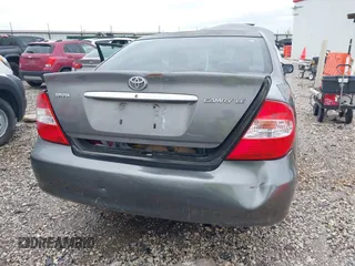 2004 Toyota Camry LE with VIN 4T1BE32K64U868802, listed as a IAAI auction lot 42141061 with 254,215 mi miles. Bid and sale history available at carsss.com. Image 12.