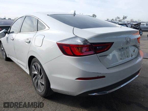 2021 Honda Insight Touring with VIN 19XZE4F97ME002699, listed as a IAAI auction lot 41397130 with 213,920 mi miles and . Bid and sale history available at carsss.com. Image 3.