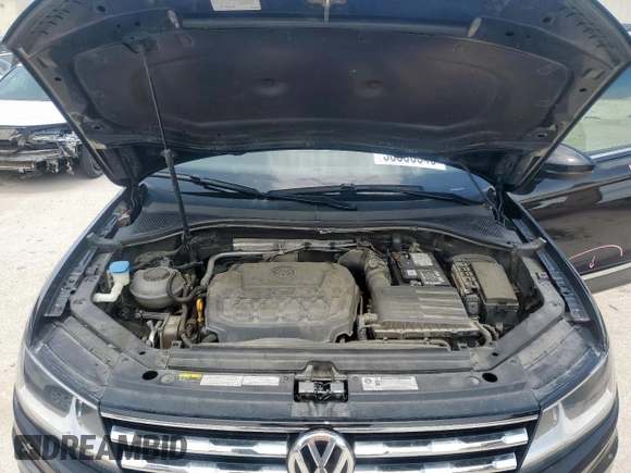 2018 Volkswagen Tiguan SEL with VIN 3VV2B7AX6JM017523, listed as a Copart auction lot 56386545 with 42,620 mi miles and Salvage title. Bid and sale history available at DreamBid. Image 12.