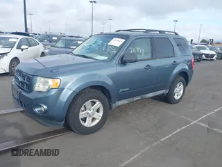 2012 Ford Escape Hybrid z VIN 1FMCU5K36CKB12795, wystawiony jako IAAI lot #41870941 z przebiegiem 91 570 mil mil oraz . Historia ofert i sprzedaży dostępna na DreamBid. Obrazek 2.
