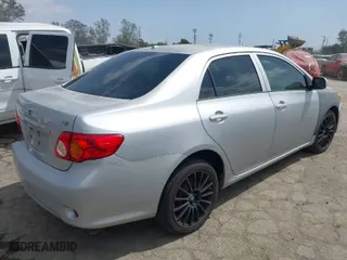 2010 Toyota Corolla with VIN 1NXBU4EE2AZ185716, listed as a IAAI auction lot 41909937 with 158,459 mi miles. Bid and sale history available at carsss.com. Image 4.