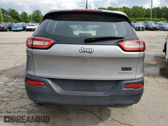 2015 Jeep Cherokee Sport with VIN 1C4PJLAB8FW761989, listed as a Copart auction lot 56869675 with 181,347 mi miles and Salvage title. Bid and sale history available at DreamBid. Image 6.