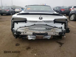 2018 Lexus LC 500h z VIN JTHHP5AY9JA000511, wystawiony jako Copart lot #72041014 z przebiegiem Nie podano mil oraz Szkoda całkowita • Salvage title. Historia ofert i sprzedaży dostępna na DreamBid. Obrazek 6.