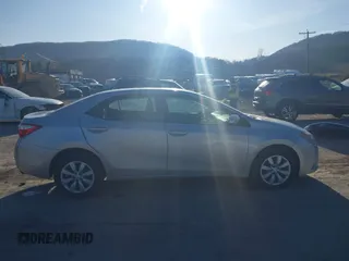 2016 Toyota Corolla L z VIN 5YFBURHE9GP566742, wystawiony jako IAAI lot #41771845 z przebiegiem 130 601 mil mil oraz . Historia ofert i sprzedaży dostępna na DreamBid. Obrazek 13.