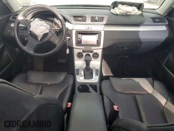 2009 Volkswagen Passat Komfort with VIN WVWXK73C09E140427, listed as a Copart auction lot 60374115 with 113,923 mi miles and Salvage title. Bid and sale history available at DreamBid. Image 8.