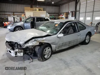 1997 Ford Thunderbird LX z VIN 1FALP62W1VH123205, wystawiony jako Copart lot #76107654 z przebiegiem 120 225 mil mil oraz Szkoda całkowita • Salvage title. Historia ofert i sprzedaży dostępna na DreamBid. Obrazek 1.