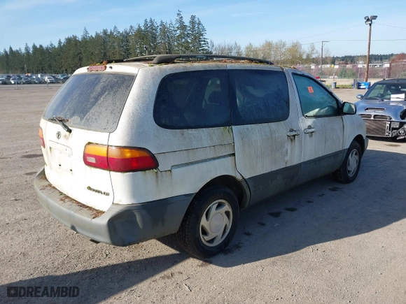 1998 Toyota Sienna LE with VIN 4T3ZF13C1WU052050, listed as a IAAI auction lot 41921780 with 144,769 mi miles. Bid and sale history available at carsss.com. Image 4.