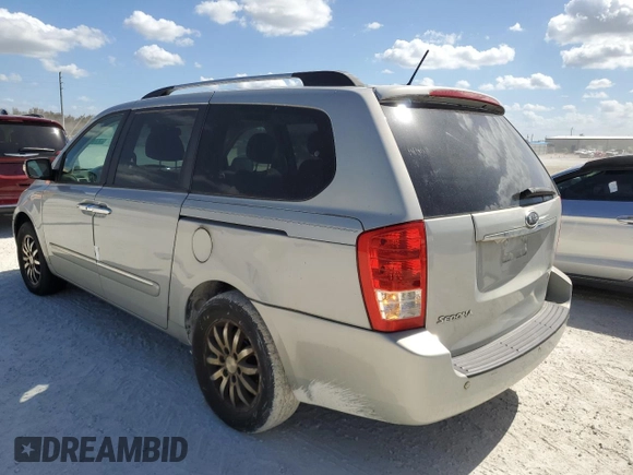 2012 Kia Sedona EX with VIN KNDMH4C72C6459882, listed as a Copart auction lot 77481744 with 136,947 mi miles and Salvage Title. Bid and sale history available at carsss.com. Image 2.