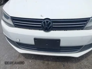 2014 Volkswagen Jetta TDI w/Premium/Nav with VIN 3VWLL7AJ4EM430524, listed as a IAAI auction lot 42268673 with 137,721 mi miles and . Bid and sale history available at DreamBid. Image 6.