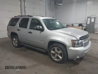 2012 Chevrolet Tahoe LT z VIN 1GNSCBE01CR326465, wystawiony jako IAAI lot #42183450 z przebiegiem 220 129 mil mil oraz . Historia ofert i sprzedaży dostępna na DreamBid. Obrazek 1.