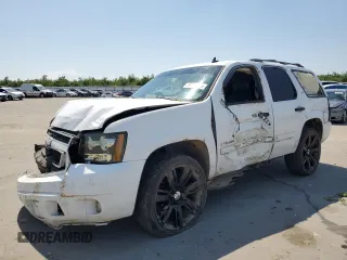 2008 Chevrolet Tahoe LTZ with VIN 1GNFC13J28R189423, listed as a Copart auction lot 55119705 with 149,009 mi miles and Salvage title. Bid and sale history available at DreamBid. Image 1.