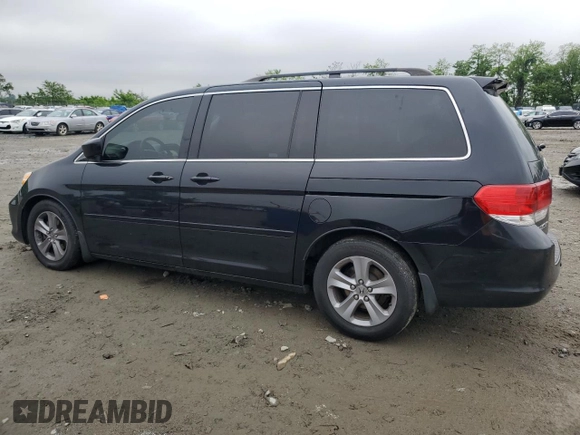 2008 Honda Odyssey Touring z VIN 5FNRL38968B014503, wystawiony jako Copart lot #56817625 z przebiegiem Nie podano mil oraz Szkoda całkowita • Salvage title. Historia ofert i sprzedaży dostępna na DreamBid. Obrazek 2.