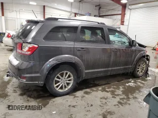 2014 Dodge Journey SXT with VIN 3C4PDCBGXET241119, listed as a Copart auction lot 45200605 with 140,173 mi miles and Non Repairable. Bid and sale history available at DreamBid. Image 3.