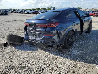 2021 BMW X6 M50i with VIN 5UXCY8C09M9E66884, listed as a Copart auction lot 63025622 with 26,220 mi miles and Salvage Title. Bid and sale history available at carsss.com. Image 4.