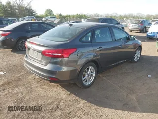 2016 Ford Focus SE with VIN 1FADP3F2XGL207906, listed as a IAAI auction lot 42099203 with 95,527 mi miles. Bid and sale history available at carsss.com. Image 4.