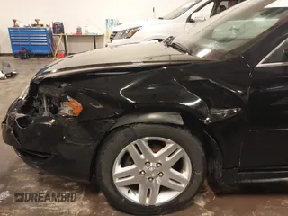 2014 Chevrolet Impala LT with VIN 2G1WB5E32E1127731, listed as a IAAI auction lot 42018987 with 163,649 mi miles and . Bid and sale history available at DreamBid. Image 17.