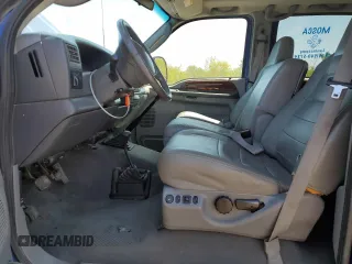 2003 Ford F-350 XL with VIN 1FTWW33P53EB90677, listed as a Copart auction lot 56300685 with 174,091 mi miles and Salvage title. Bid and sale history available at DreamBid. Image 7.