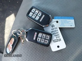 2018 Honda Odyssey Elite z VIN 5FNRL6H91JB070355, wystawiony jako IAAI lot #41975916 z przebiegiem 147 022 mil mil oraz . Historia ofert i sprzedaży dostępna na DreamBid. Obrazek 11.