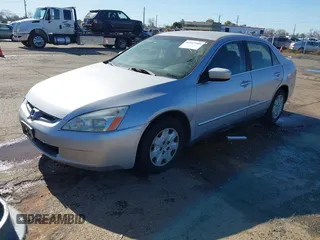 2003 Honda Accord LX with VIN JHMCM56303C043710, listed as a IAAI auction lot 41517509 with 283,083 mi miles and . Bid and sale history available at DreamBid. Image 2.