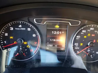 2015 Audi Q3 2.0T Prestige with VIN WA1FFCFS4FR008474, listed as a Copart auction lot 36881453 with 127,057 mi miles. Bid and sale history available at carsss.com. Image 9.