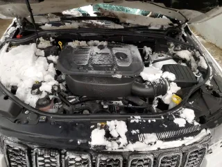 2021 Jeep Grand Cherokee High Altitude with VIN 1C4RJFCG5MC736971, listed as a Copart auction lot 42074705 with 37,490 mi miles and Salvage title. Bid and sale history available at DreamBid. Image 12.