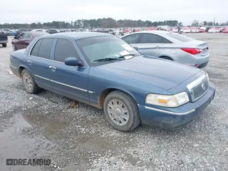 2007 Mercury Grand Marquis GS with VIN 2MEFM74V27X609128, listed as a IAAI auction lot 41474359 with 99,050 mi miles. Bid and sale history available at carsss.com. Image 1.