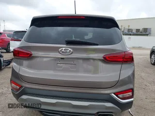2019 Hyundai Santa Fe SE z VIN 5NMS23AD2KH014037, wystawiony jako IAAI lot #42110778 z przebiegiem 48 975 mil mil oraz . Historia ofert i sprzedaży dostępna na DreamBid. Obrazek 17.