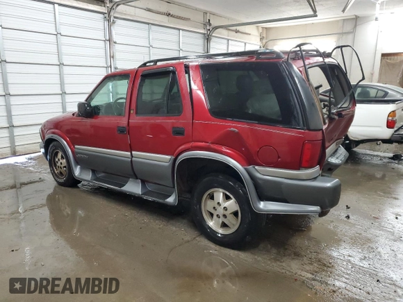 1999 GMC Jimmy SLE with VIN 1GKDT13W3X2535602, listed as a Copart auction lot 83250924 with 203,134 mi miles and Salvage Title. Bid and sale history available at carsss.com. Image 2.