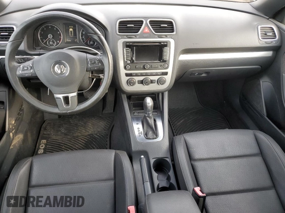 2015 Volkswagen Eos Komfort with VIN WVWBW8AH4FV001321, listed as a Copart auction lot 78718404 with 73,296 mi miles and Salvage Title. Bid and sale history available at DreamBid. Image 8.