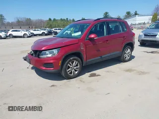 2015 Volkswagen Tiguan SE z VIN WVGBV7AX7FW056002, wystawiony jako IAAI lot #42122641 z przebiegiem 77 037 mil mil oraz . Historia ofert i sprzedaży dostępna na DreamBid. Obrazek 2.