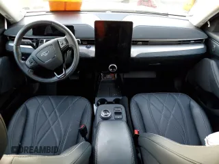 2021 Ford Mustang Mach-E Select z VIN 3FMTK1SS9MMA35016, wystawiony jako Copart lot #71589072 z przebiegiem Nie podano mil oraz . Historia ofert i sprzedaży dostępna na DreamBid. Obrazek 8.
