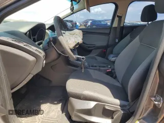 2012 Ford Focus SE z VIN 1FAHP3K24CL338153, wystawiony jako Copart lot #56161925 z przebiegiem 167 146 mil mil oraz Szkoda całkowita • Salvage title. Historia ofert i sprzedaży dostępna na DreamBid. Obrazek 7.