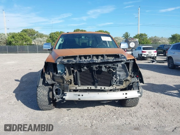 2016 Toyota Tundra SR z VIN 5TFRM5F19GX102715, wystawiony jako IAAI lot #41265300 z przebiegiem 109 619 mil mil oraz . Historia ofert i sprzedaży dostępna na DreamBid. Obrazek 6.