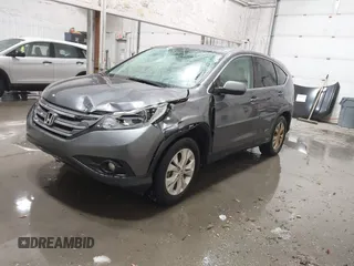 2013 Honda CR-V EX with VIN 2HKRM4H59DH682484, listed as a IAAI auction lot 41504589 with 208,260 mi miles and . Bid and sale history available at DreamBid. Image 2.