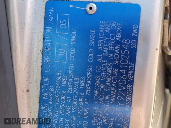 2006 Suzuki XL7 z VIN JS3TY92V064102548, wystawiony jako Copart lot #68875654 z przebiegiem 261 711 mil mil oraz Szkoda całkowita • Salvage title. Historia ofert i sprzedaży dostępna na DreamBid. Obrazek 15.