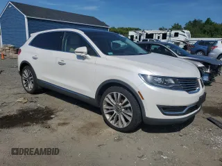 2016 Lincoln MKX Reserve with VIN 2LMTJ8LPXGBL38015, listed as a Copart auction lot 60981375 with 101,589 mi miles and Salvage title. Bid and sale history available at DreamBid. Image 4.