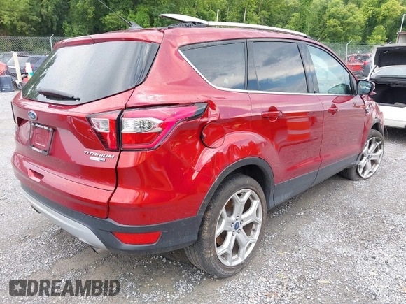 2019 Ford Escape Titanium with VIN 1FMCU9J97KUC08287, listed as a IAAI auction lot 42702548 with 45,207 mi miles and . Bid and sale history available at DreamBid. Image 4.