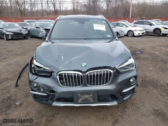 2017 BMW X1 xDrive28i with VIN WBXHT3C35H5F74213, listed as a IAAI auction lot 41589180 with 58,990 mi miles. Bid and sale history available at carsss.com. Image 11.