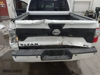 2018 Nissan Titan SV with VIN 1N6AA1E63JN539220, listed as a IAAI auction lot 41487109 with 122,144 mi miles. Bid and sale history available at carsss.com. Image 6.