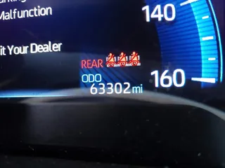 2021 Toyota Corolla Hybrid LE with VIN JTDEAMDEXMJ018828, listed as a IAAI auction lot 41633192 with 63,302 mi miles. Bid and sale history available at carsss.com. Image 16.