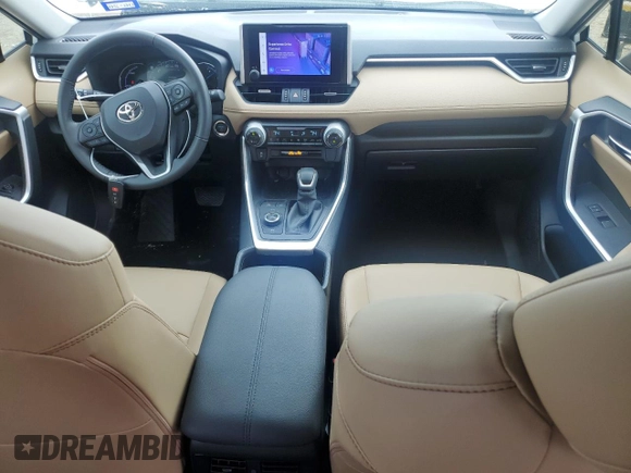 2024 Toyota RAV4 Hybrid XLE Premium with VIN JTMB6RFV6RJ054408, listed as a Copart auction lot 52120745 with 2,961 mi miles and Salvage Title. Bid and sale history available at DreamBid. Image 8.
