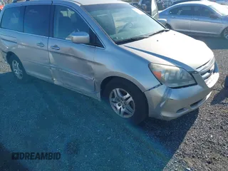 2005 Honda Odyssey EX with VIN 5FNRL38445B411188, listed as a IAAI auction lot 42060307 with 240,688 mi miles. Bid and sale history available at carsss.com. Image 6.