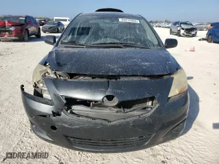 2011 Toyota Yaris with VIN JTDBT4K33B1404938, listed as a Copart auction lot 44312955 with 0 mi miles and Salvage Title. Bid and sale history available at carsss.com. Image 5.