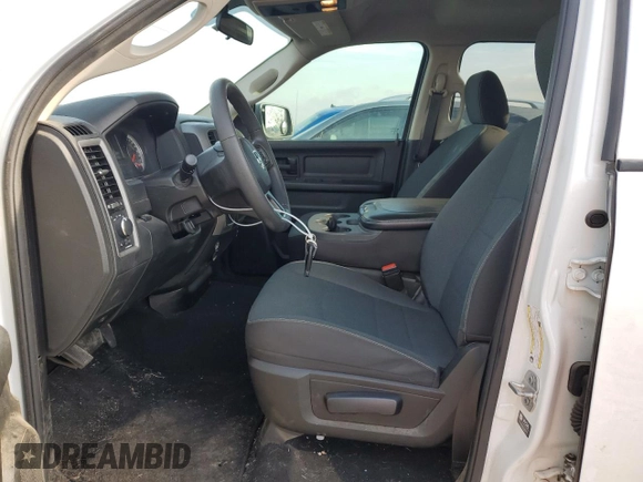 2022 Ram 1500 Tradesman with VIN 1C6RR6FG9NS229736, listed as a Copart auction lot 45634255 with 215,059 mi miles and Salvage title. Bid and sale history available at DreamBid. Image 7.